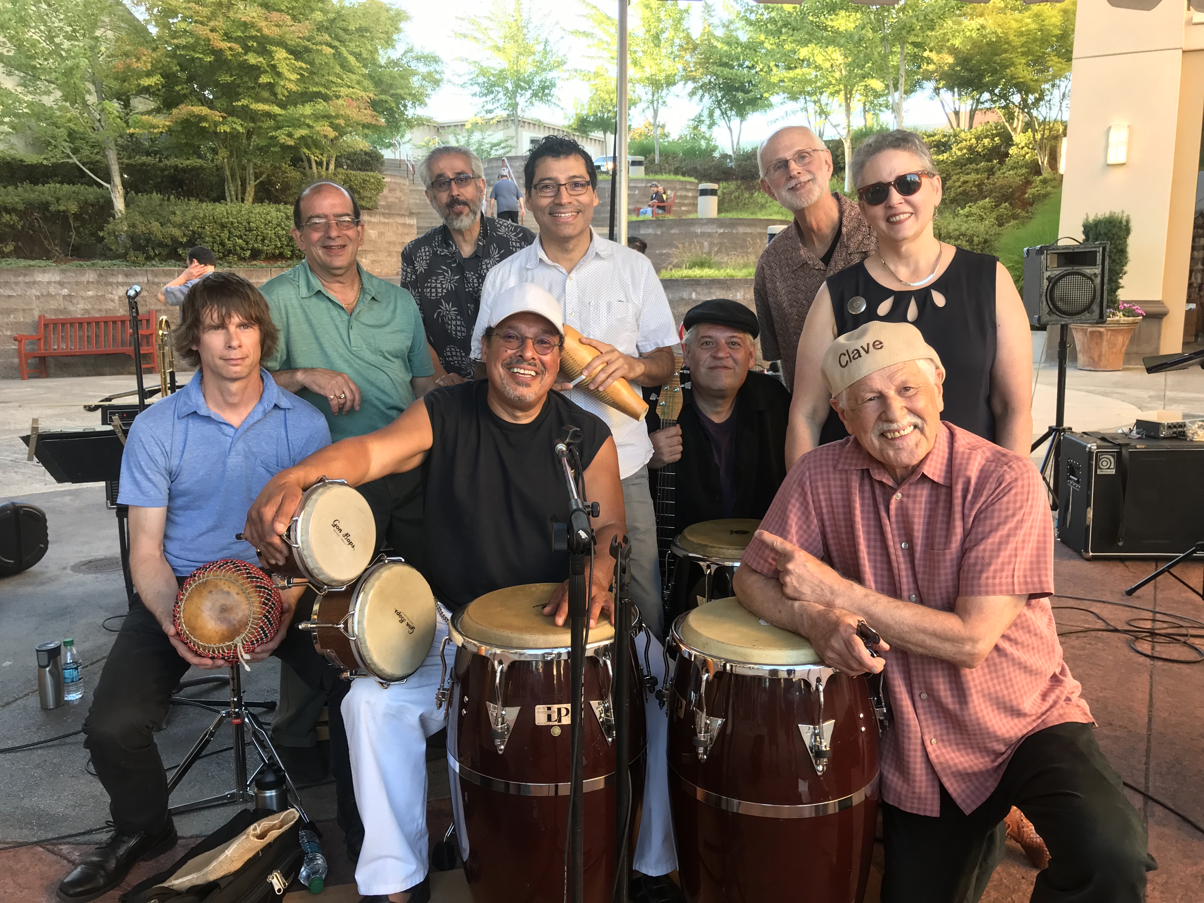 Members of the large Latin jazz band, Pa'lante pose with their instruments