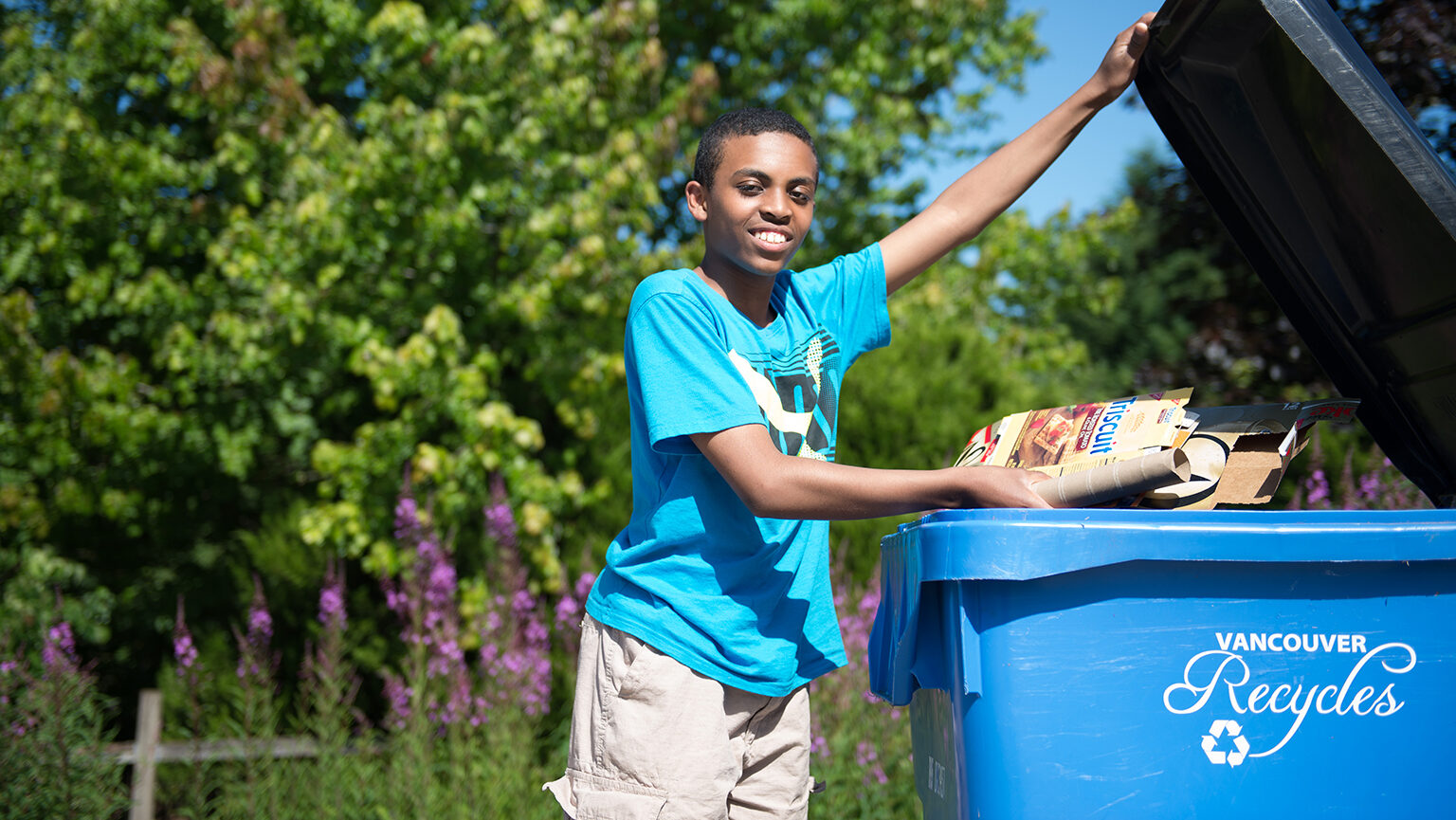 Tossing items into and recycle cart and recycling properly