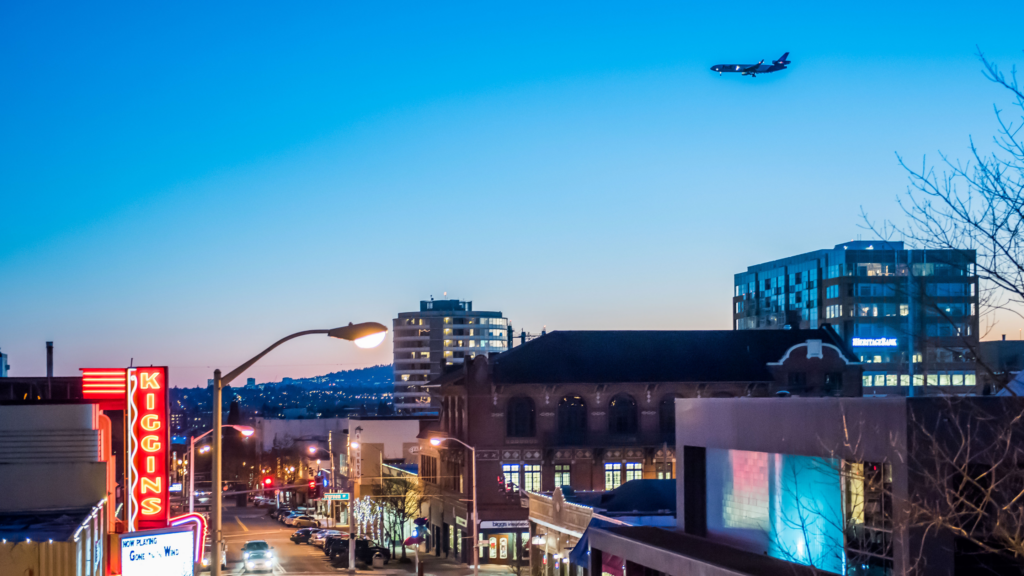 Airplane flying over downtown Vancouver