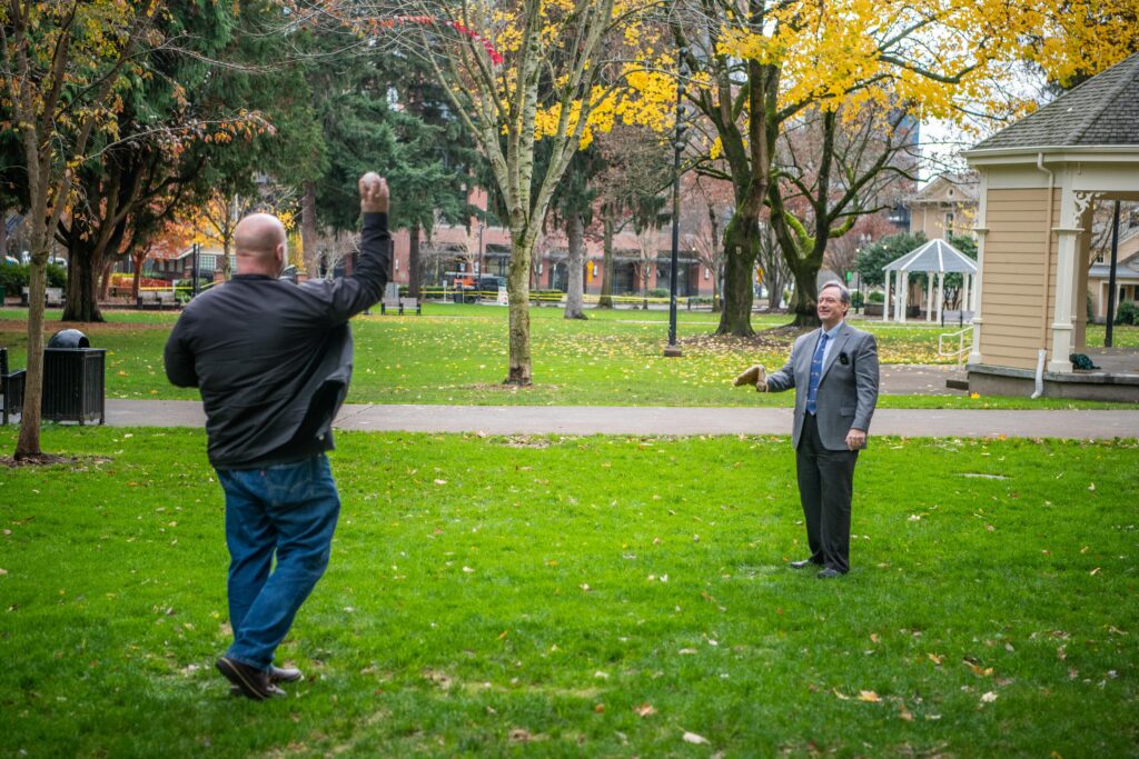 John and Lon playing catch at Esther Short Park