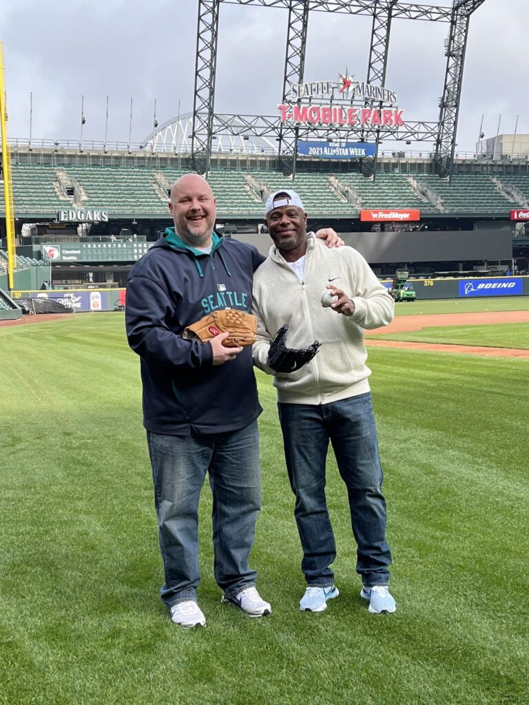 John Scukanec completes his 365th day of playing catch with someone new at SafeCo field with idol Ken Griffey, Jr. 