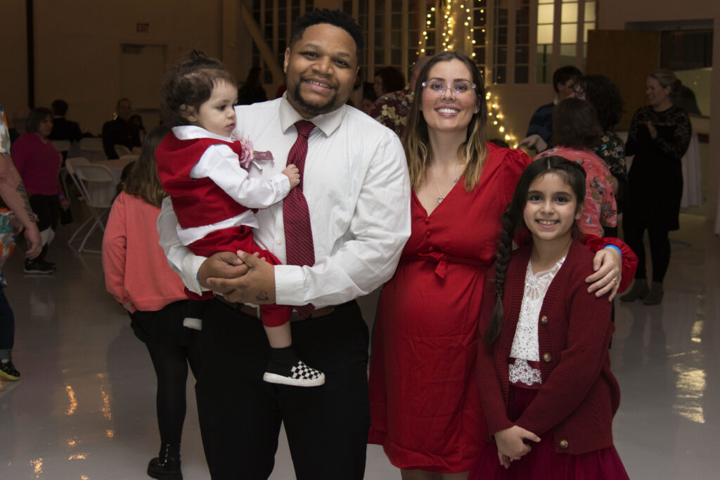 Two adults and two children at the Family Valentine's Ball