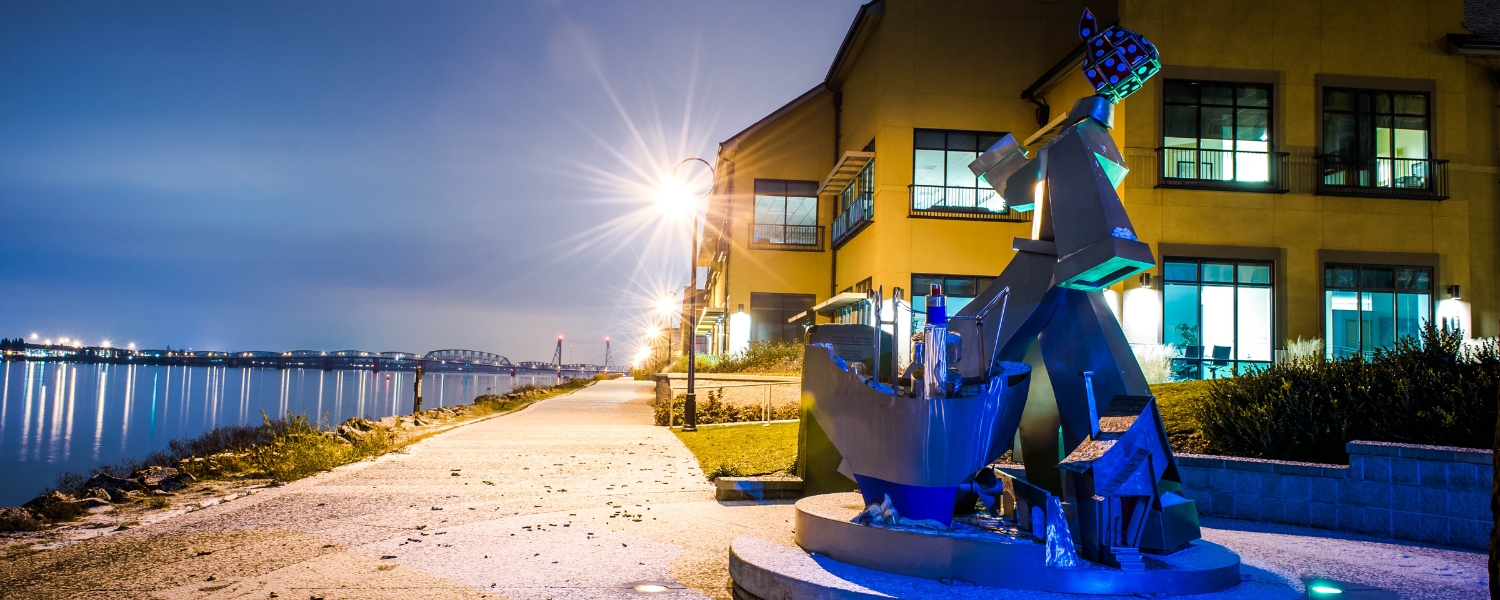 Rosie the Riveter sculpture overlooking the Columbia River on a winter night