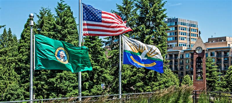 Series of flags. State of Washington, United States and City of Vancouver (current) flags.